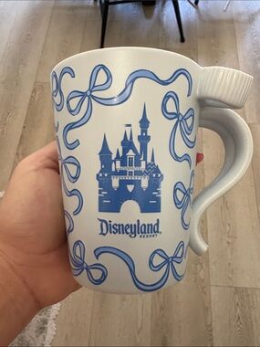 Disneyland Starbucks White Ceramic Mug with Blue Castle and Ribbon Design